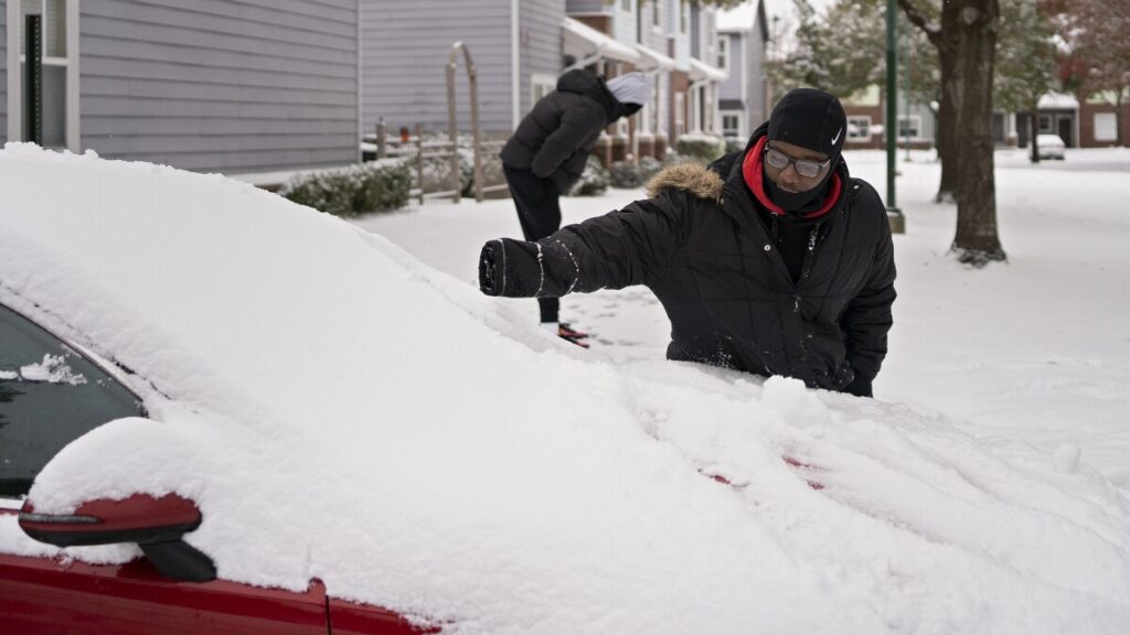 Snowfall tapers along the Gulf Coast, but temperatures will plunge to dangerous lows